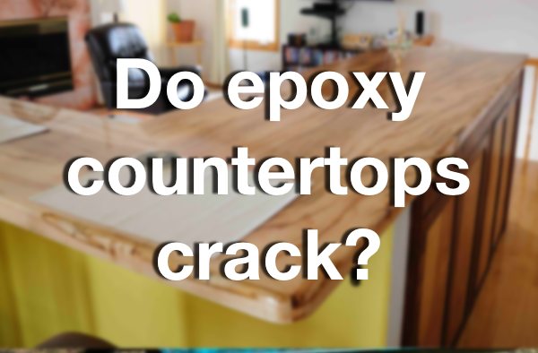 A blurred photo of a wooden epoxy countertop with a text overlay that says "Do epoxy countertops crack?"