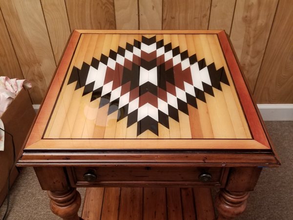 An end table with a coating of UltraClear Bar & Table Top Epoxy, intended to last for many years without reapplication.