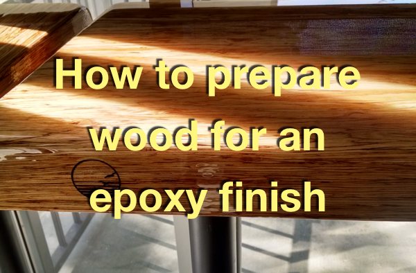 A photo of a wooden table top with an epoxy finish. There's a text overlay that says "How to prepare wood for an epoxy finish".